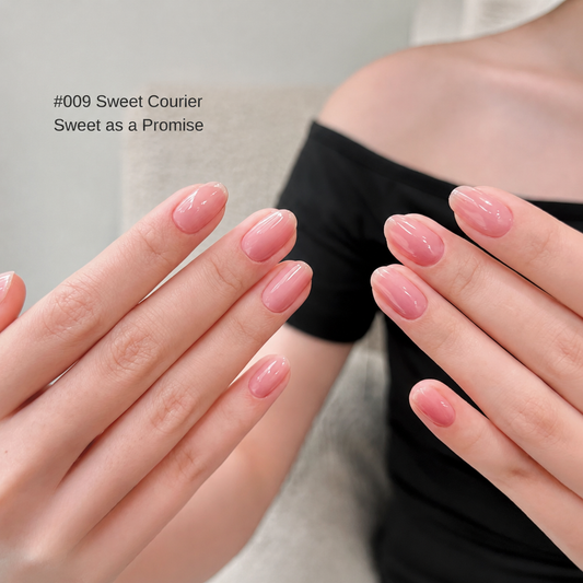 Sweet Courier light pink glossy nail color gel manicure on two hands