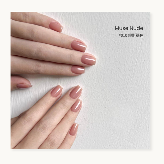 Muse nude gel nail polish manicure on overlapping hands