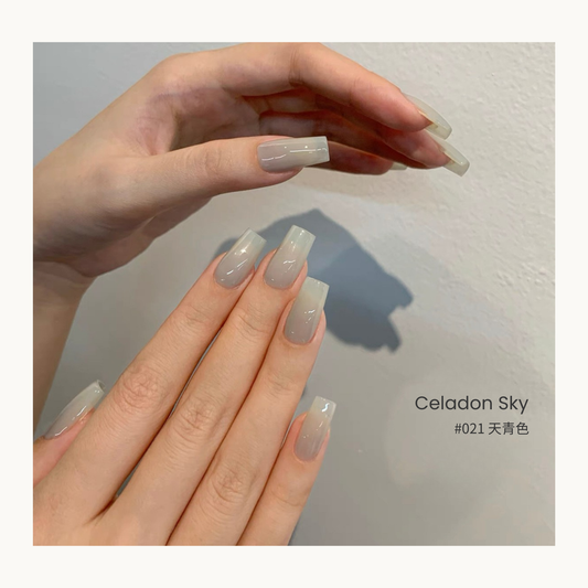 Celadon Sky nail color gel manicure with a visible hand shadow