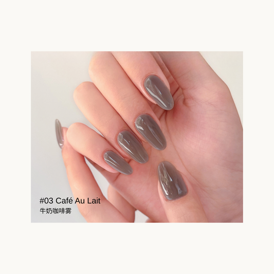 Sheer taupe beige gel manicure in the Café Au Lait shade