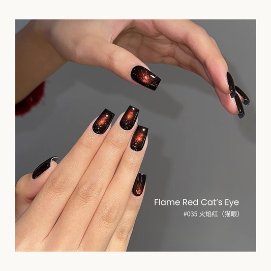 Flame Red Cat's Eye nail color gel manicure with reflective shimmer