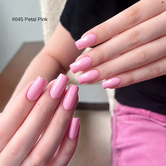 Petal Pink bright glossy nail color gel manicure on two hands