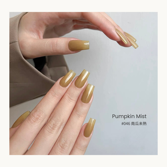 Pumpkin Mist nail color gel manicure in a curved hand pose
