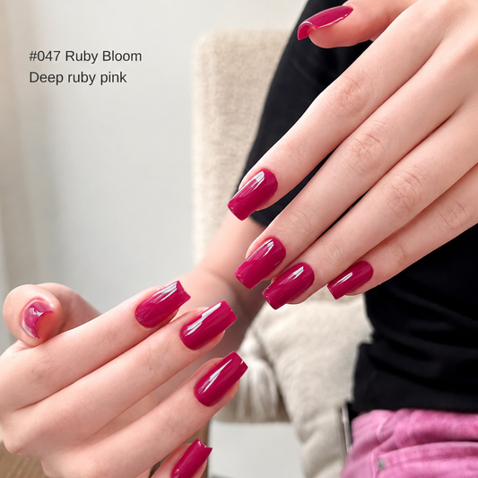 Ruby Bloom rich berry glossy nail color gel manicure on two hands