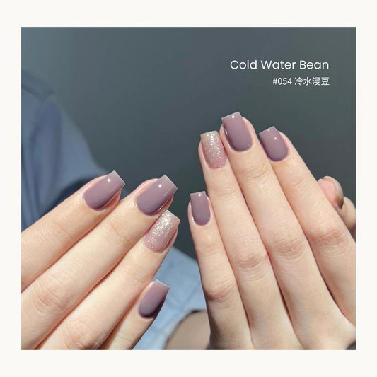 Cold water bean mauve gel manicure with glitter accents