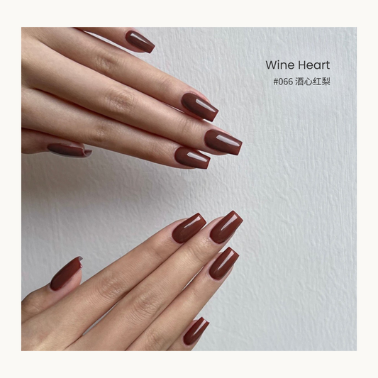 Wine Heart nail color gel manicure on overlapping hands