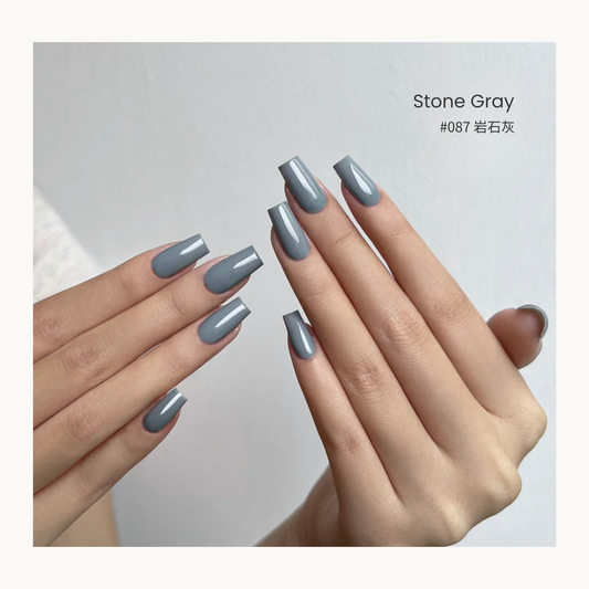 Stone gray blue gel nail polish manicure on two hands