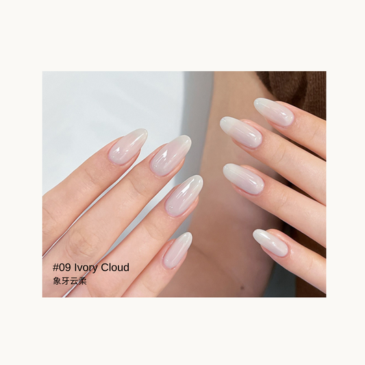 Sheer milky ivory gel manicure in the Ivory Cloud shade