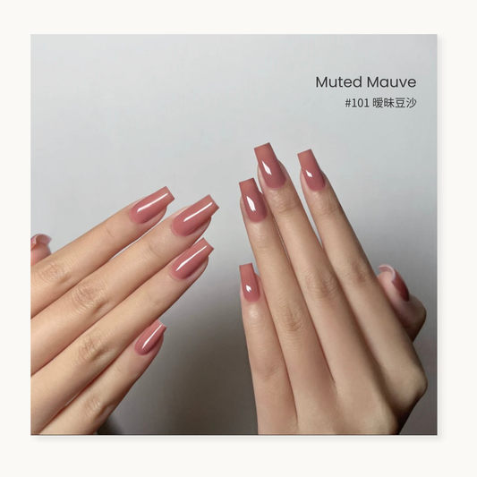 Muted mauve gel nail polish manicure on two hands