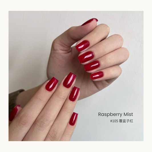 Raspberry Mist nail color gel manicure in a curved hand pose