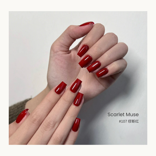 Scarlet Muse nail color gel manicure in a curved hand pose