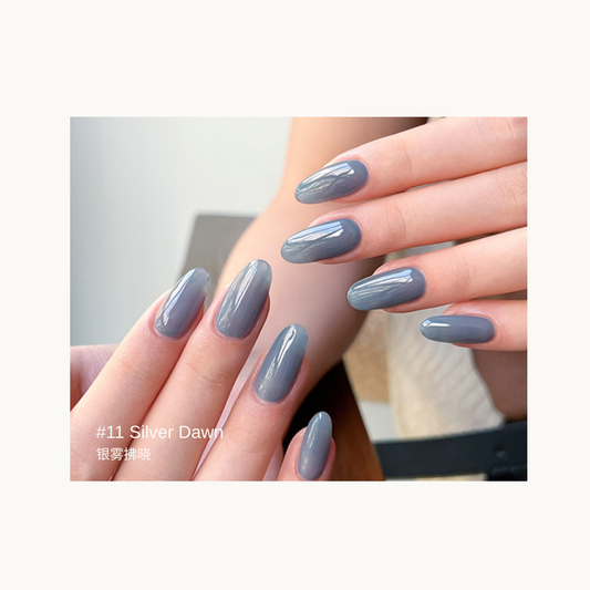 Sheer silvery blue-gray gel manicure in the Silver Dawn shade