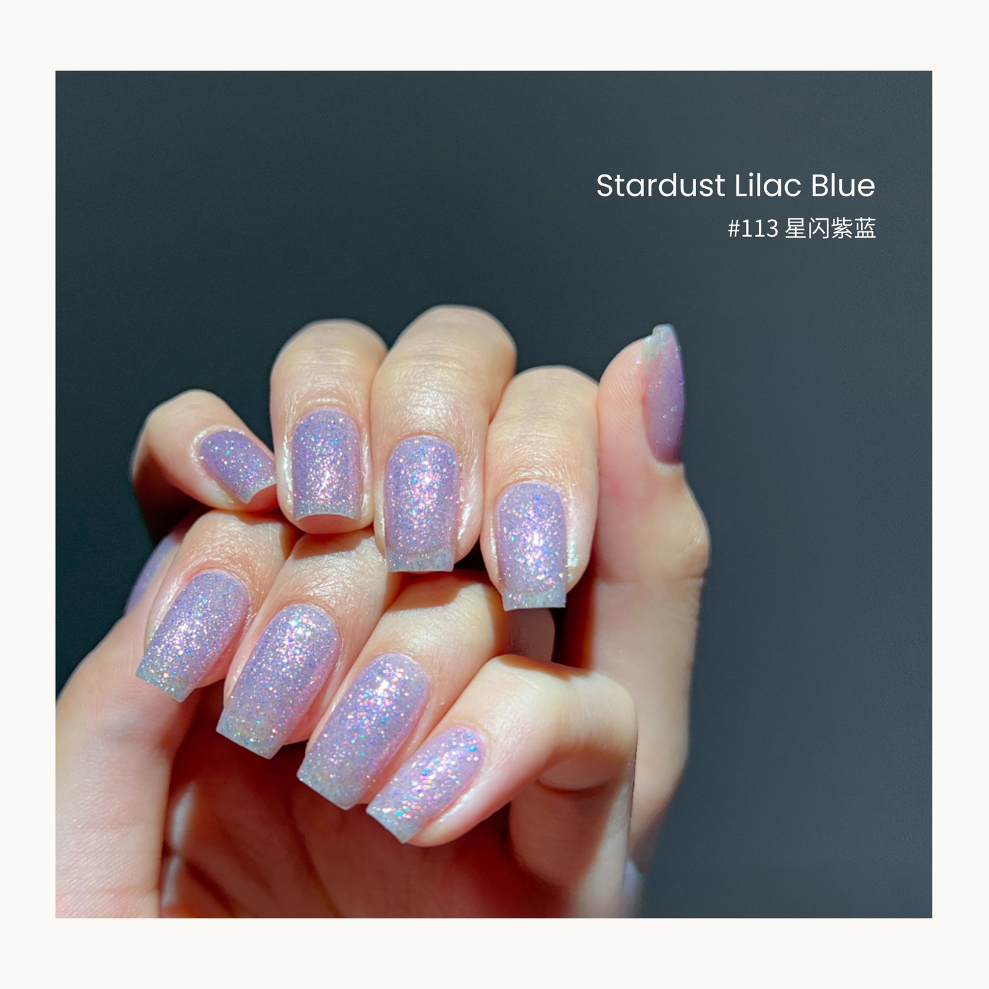 MODING #113 Stardust Lilac Blue gel polish with shimmering purple-blue cat-eye sparkle.