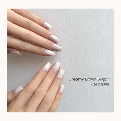 MODING #116 Creamy Brown Sugar gel polish with a milky beige base and speckled effect.