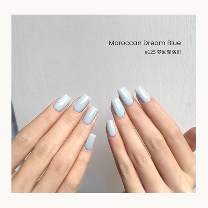 MODING #125 Moroccan Dream Blue gel polish in a pale dusty aqua blue shade.