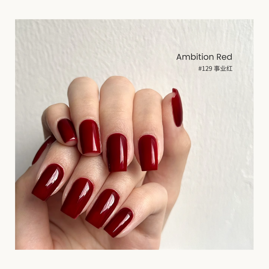 Deep burgundy-red gel polish manicure with glossy nails