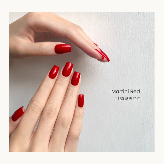 Bright red gel polish manicure with glossy nails
