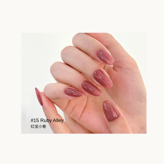 Sheer ruby red gel manicure in the Ruby Alley shade