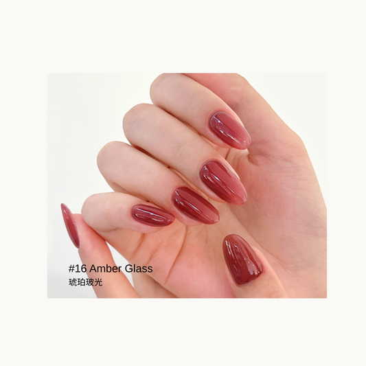Sheer amber red-brown gel manicure in the Amber Glass shade