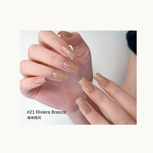 Sheer nude-beige gel polish shown on glossy square nails