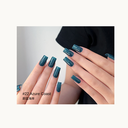 Deep teal gel polish shown on glossy square nails