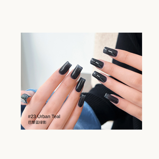 Dark blue-teal gel polish shown on glossy square nails