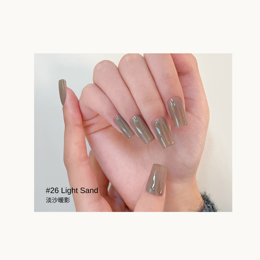 Taupe-beige gel polish shown on glossy square nails