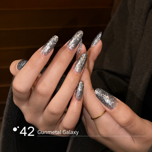 Gunmetal silver glitter builder gel manicure on long nail extensions