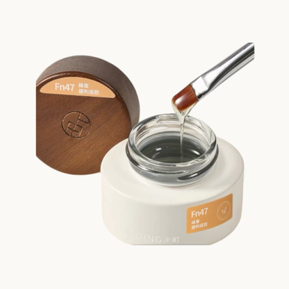MODING Fn47 Honey-Texture Nail Builder Base Gel in a professional glass jar with wooden lid, featuring a thick self-leveling clear gel consistency for nail reinforcement and extensions. HEMA-free and TPO-free formula.