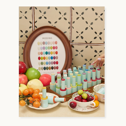 Full 48-color display of the hema-free, tpo-free and tmpta-free  gel brand Moding French Collection nail gels in an elegant wooden frame.