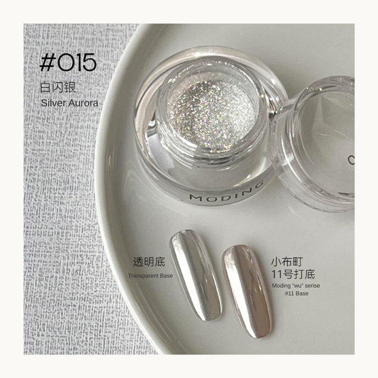 Silver Aurora nail art effect powder jar with two base comparison swatches