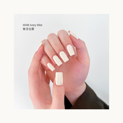 MODING M048 Ivory Mist creamy ivory white nail polish on model hands