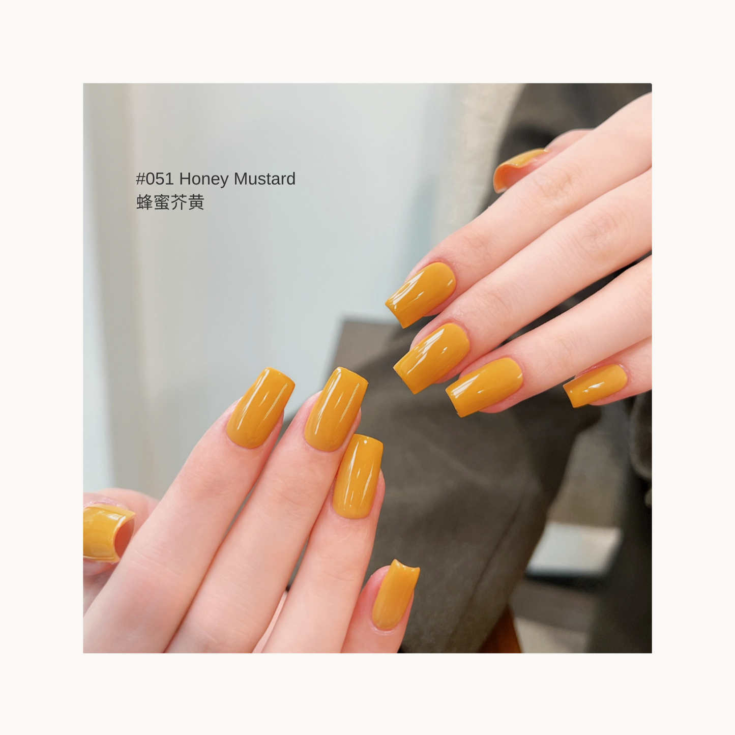 MODING M051 Honey Mustard warm mustard yellow nail polish shown on hands