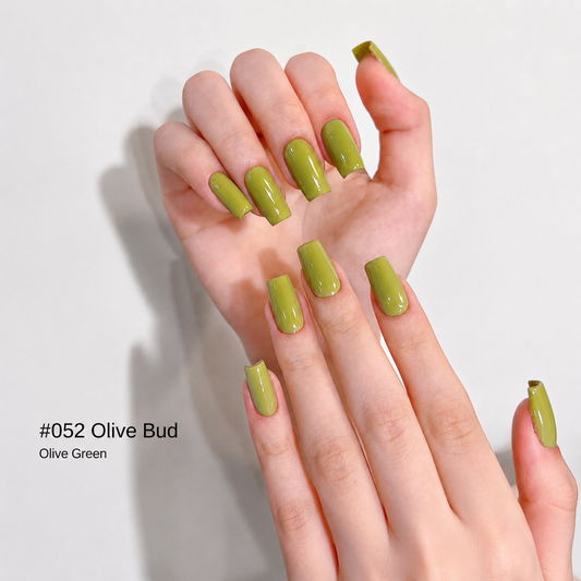 Glossy olive green nail color gel manicure on two hands