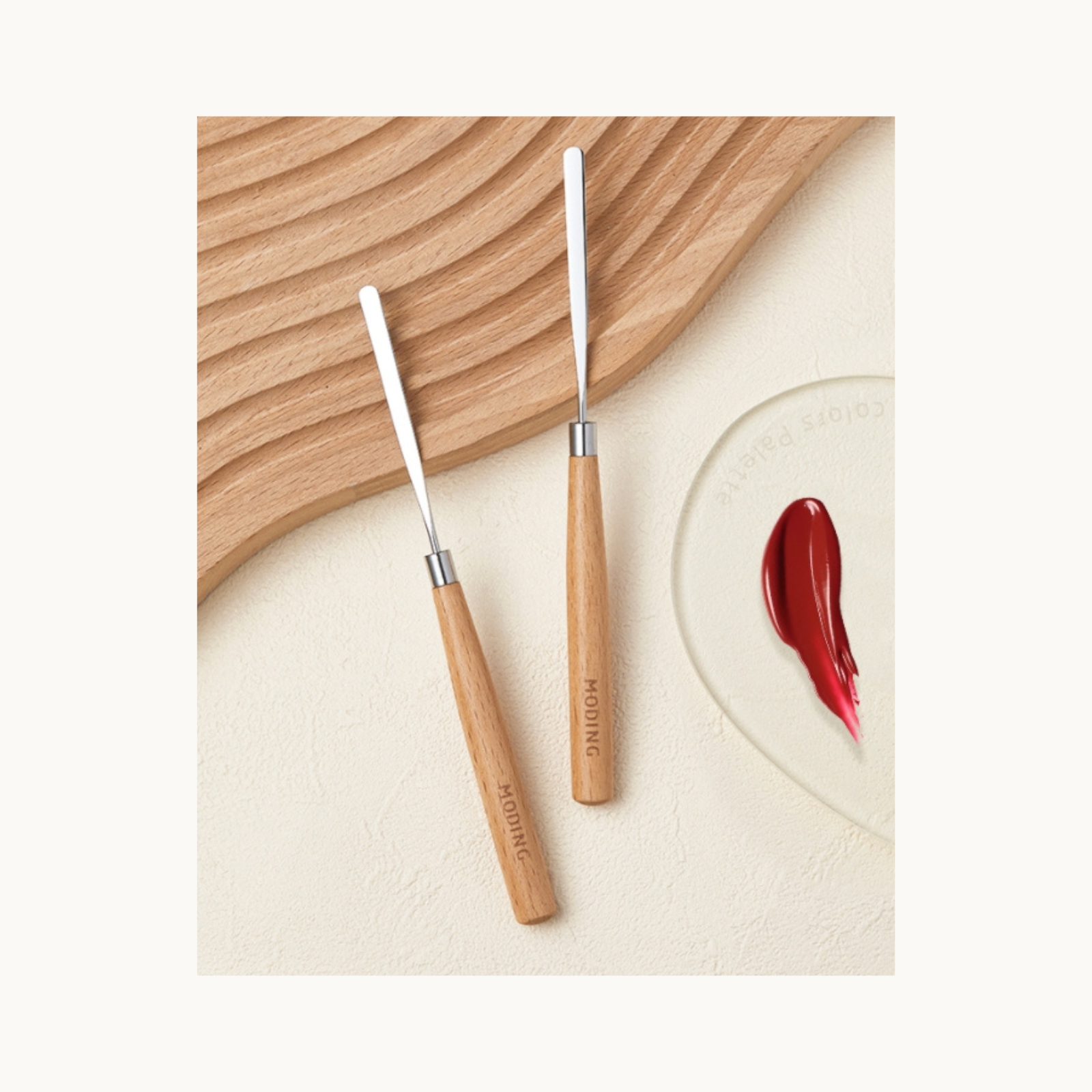 Pair of MODING nail gel spatulas with wooden handles used for mixing gel colors on palette