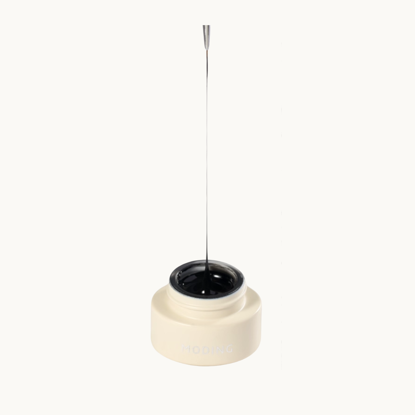 Detailed image of moding #117 Ink Thread Black nail gel with black stringy pull-thread texture