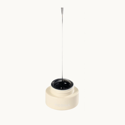 Detailed image of moding #117 Ink Thread Black nail gel with black stringy pull-thread texture