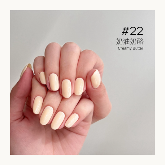 Hand swatch of moding #22 Creamy Butter Nude nail gel showing smooth creamy nude finish