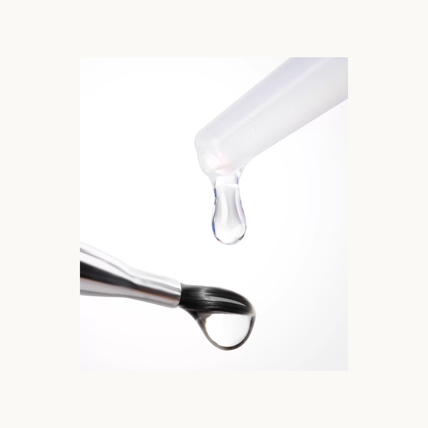 Close-up of MODING brush cleaner liquid dropping onto nail art brush bristles
