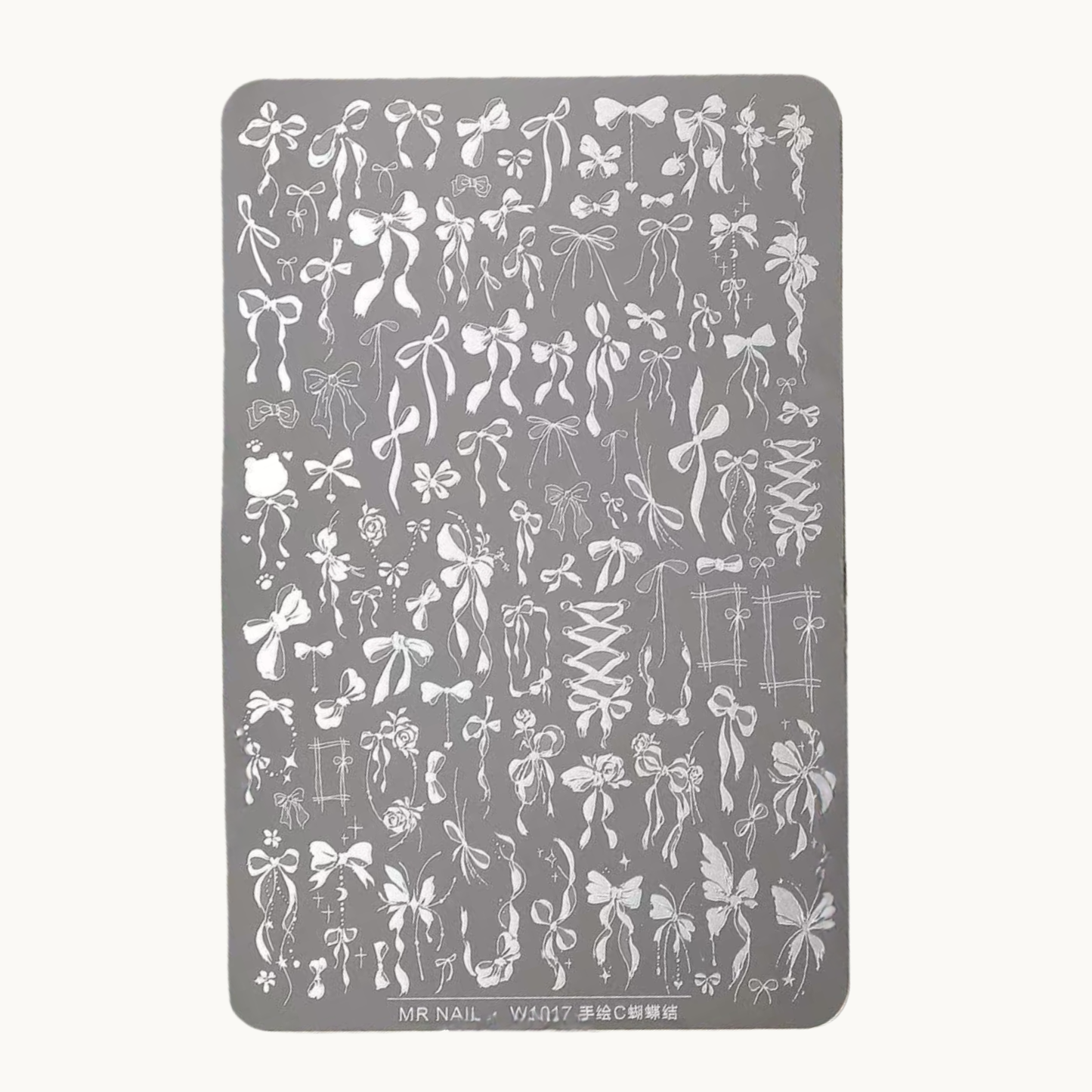 MR NAIL W1017 hand-drawn ribbon stamping plate product photo, detailed bow designs on large nail art steel plate
