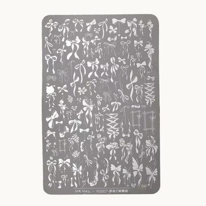 MR NAIL W1017 hand-drawn ribbon stamping plate product photo, detailed bow designs on large nail art steel plate