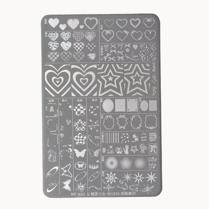 Heart and star mixed-design nail stamping plate W1026 by MR NAIL, showing various hearts, stars, ribbons, frames, butterflies, and pattern motifs.