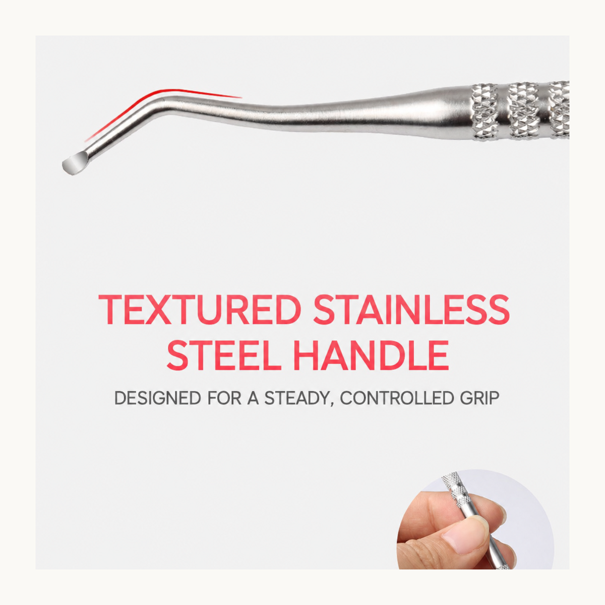 Close-up of textured stainless steel handle on a double-ended nail cleaner