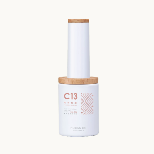 moding c13 peel-off base nail gel bottle with wooden cap on white background