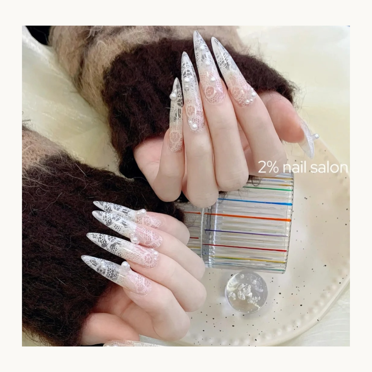 NF Select Lace Nail Transfer Foil applied on stiletto nails, showing sheer floral lace pattern for romantic, elegant nail art