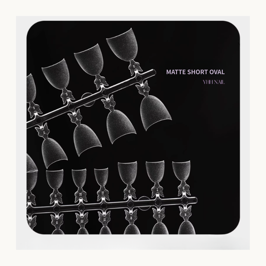 Matte short oval clear nail tips arranged on numbered display strips