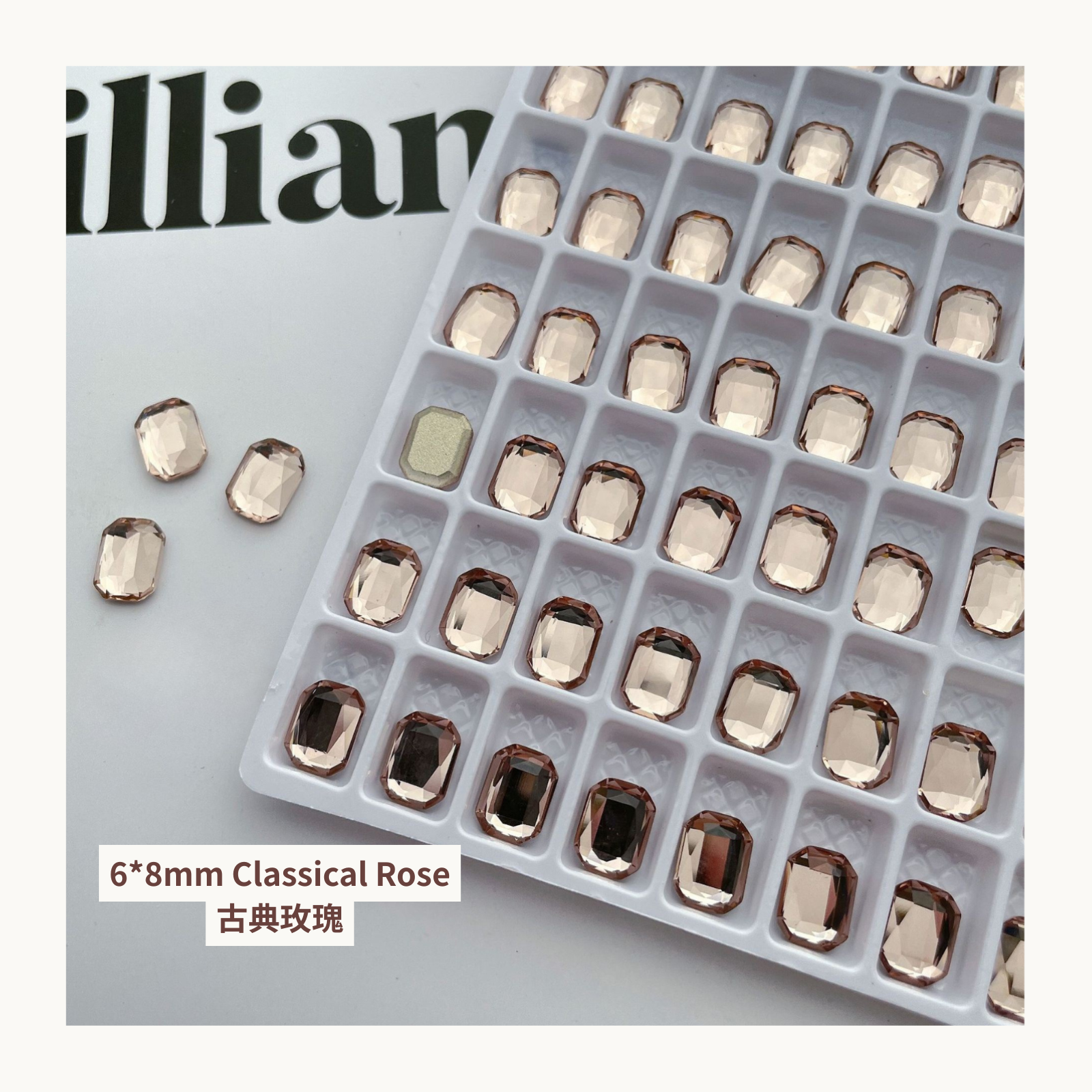 Clear octagon K9 flat back rhinestones classical rose 6x8mm shown on tray and single piece for nail art use