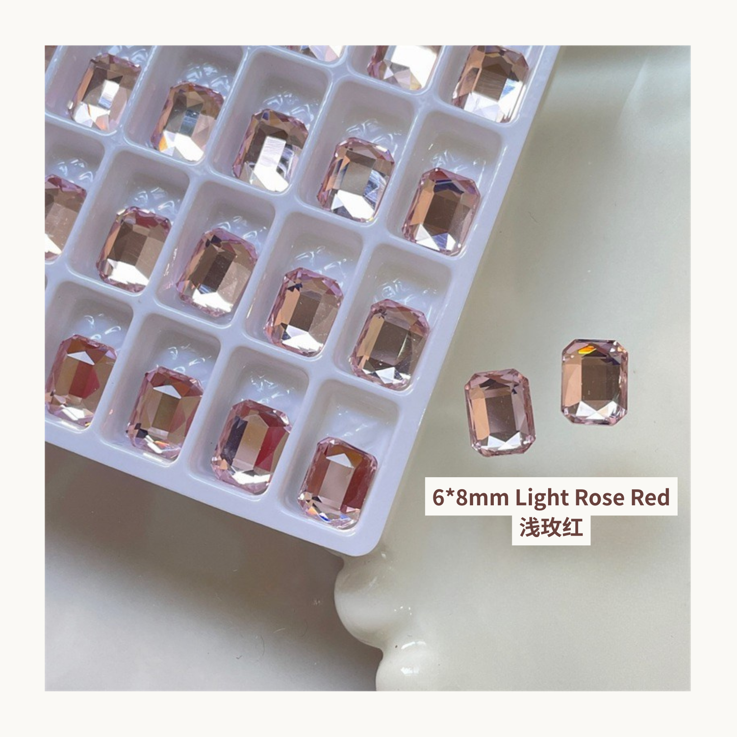 Clear octagon K9 flat back rhinestones light rose red 6x8mm shown on tray and single piece for nail art use