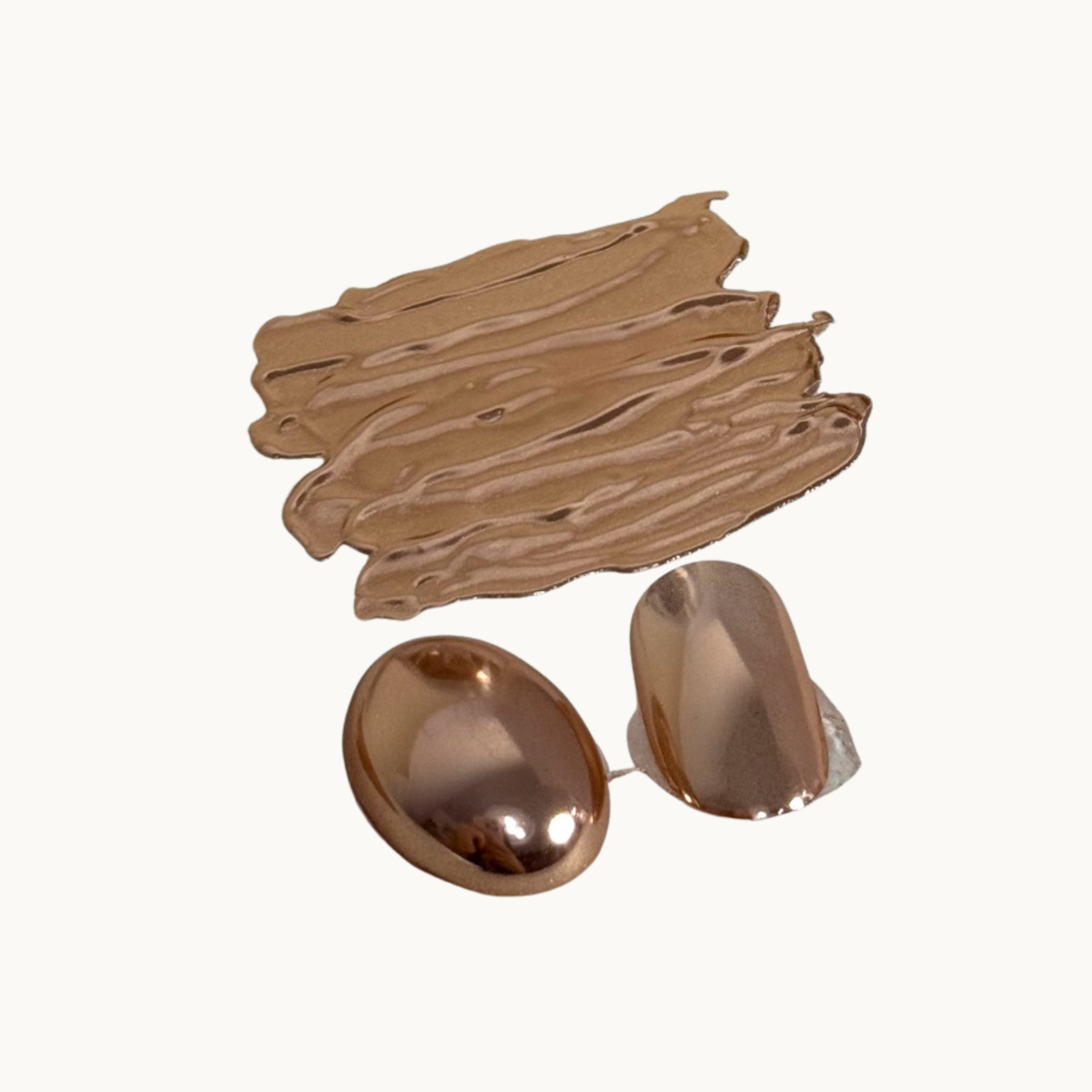 Rose gold mirror chrome nail powder with a soft metallic finish and high-shine reflection.