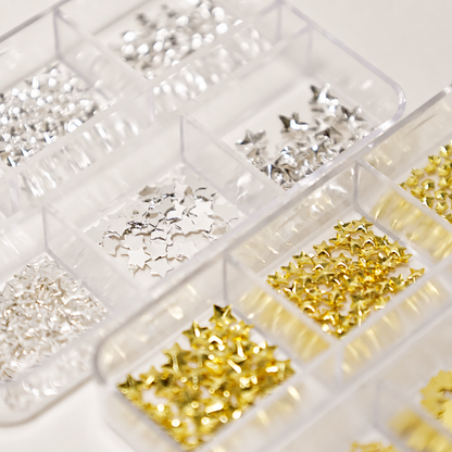 Close-up of gold and silver star nail studs